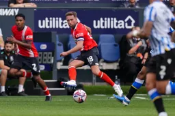 Jordan Clark plays the ball inside