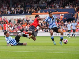 Reuell Walters goes flying through the air