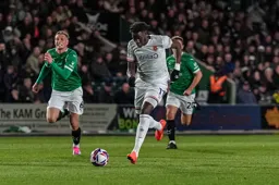 Elijah Adebayo breaks through the Argyle defence