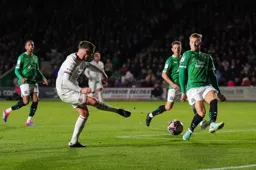 Jordan Clark shoots frim inside the penalty area