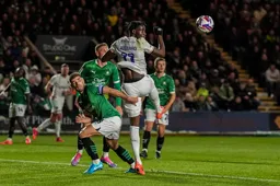 Elijah Adebayo flicks the ball on with his head