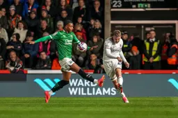 Alfie Doughty plays the ball across