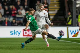 Alfie Doughty sees his attempted pass blocked