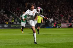 Tahith Chong brings a high ball under control