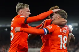 Happy Hatters celebrate the first goal
