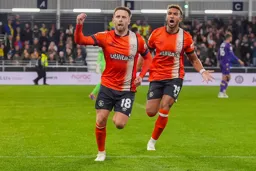 Jordan Clark celebrates his goal with Jacob Brown