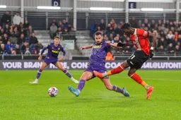 Elijah Adebayo fires in a shot at goal