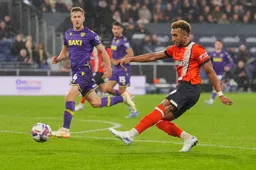 Jacob Brown takes a shot at goal