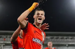 Tom Krauss shows his delight after scoring the Town`s second goal