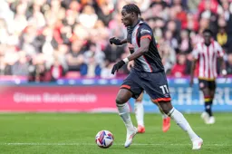 Elijah Adebayo takes possession of the ball