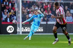 Thomas Kaminski cleaars the ball