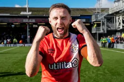 Jordan Clark celebrates with a double fist pump following the final whistle