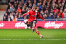 Alfie Doughty plays a long ball forward