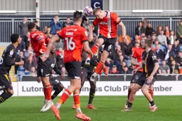 Mark McGuinness rises highest to win a header
