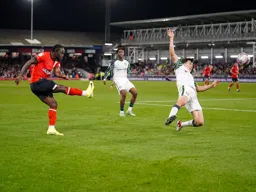 Victor Moses hammers the ball across the penalty area