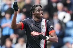 Elijah Adebayo looks happy. For now anyway