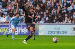 Carlton Morris scores the Town`s first goal from the penalty spot