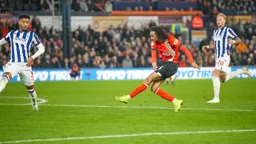 Tahith Chong hammers in the Town`s goal to level the score