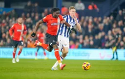 Elijah Adebayo goes past Torbjorn Heggem