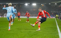 Alfie Doughty sends a cross towards the penalty area