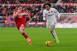 Tahith Chong is closed down by Aidan Morris