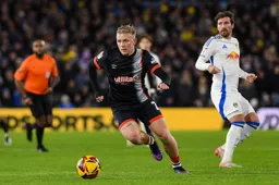 Joe Taylor moves forward with the ball
