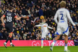 Teden Mengi goes in with a high boot