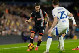 Tom Krauss finds Sam Byram blocking his path