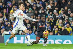 Victor Moses goes to ground as he passes the ball inside
