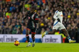 Victor Moses moves away with the ball
