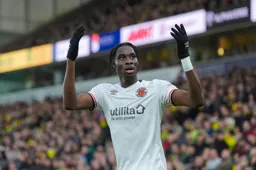 Elijah Adebayo aknowledges the travelling Hatters after scoring the first goal