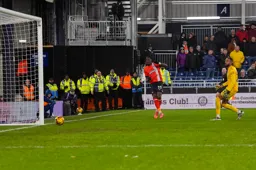 Elijah Adebayo scores the Town`s only goal