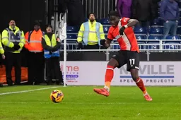 Elijah Adebayo passes the ball into the empty net following an error in the City defence