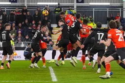 Carlton Morris heads in the Town's first goal