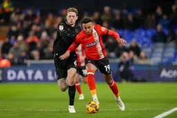 Jacob Brown in a tussle down the wing