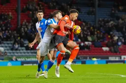 Jacob Brown shields the ball