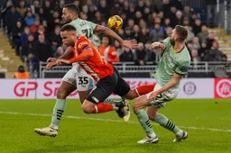 Carlton Morris takes a tumble