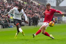 Pelly Mpanzu gets the ball across