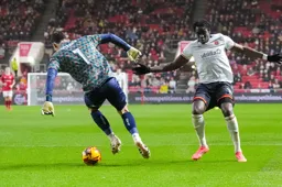 Elijah Adebayo dances with the City goalkeeper
