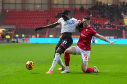 Elijah Adebayo shields the ball