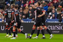 Carlton Morris accepts the congratulations