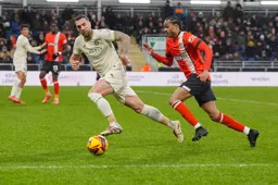 Tahith Chong in a race for the ball