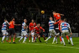 Mark McGuinness heads in the Town goal