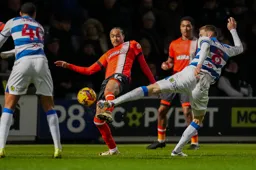 Tahith Chong wins the ball