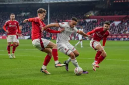 Carlton Morris battles through