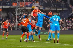 Mark McGuinness rises highest