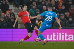 Daiki Hashioka goes in for a tackle