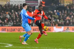 Victor Moses wins the ball