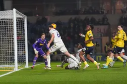 Mark McGuinness heads in the Town's second goal