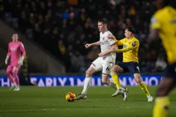 Mark McGuinness attempts to play the ball forwards